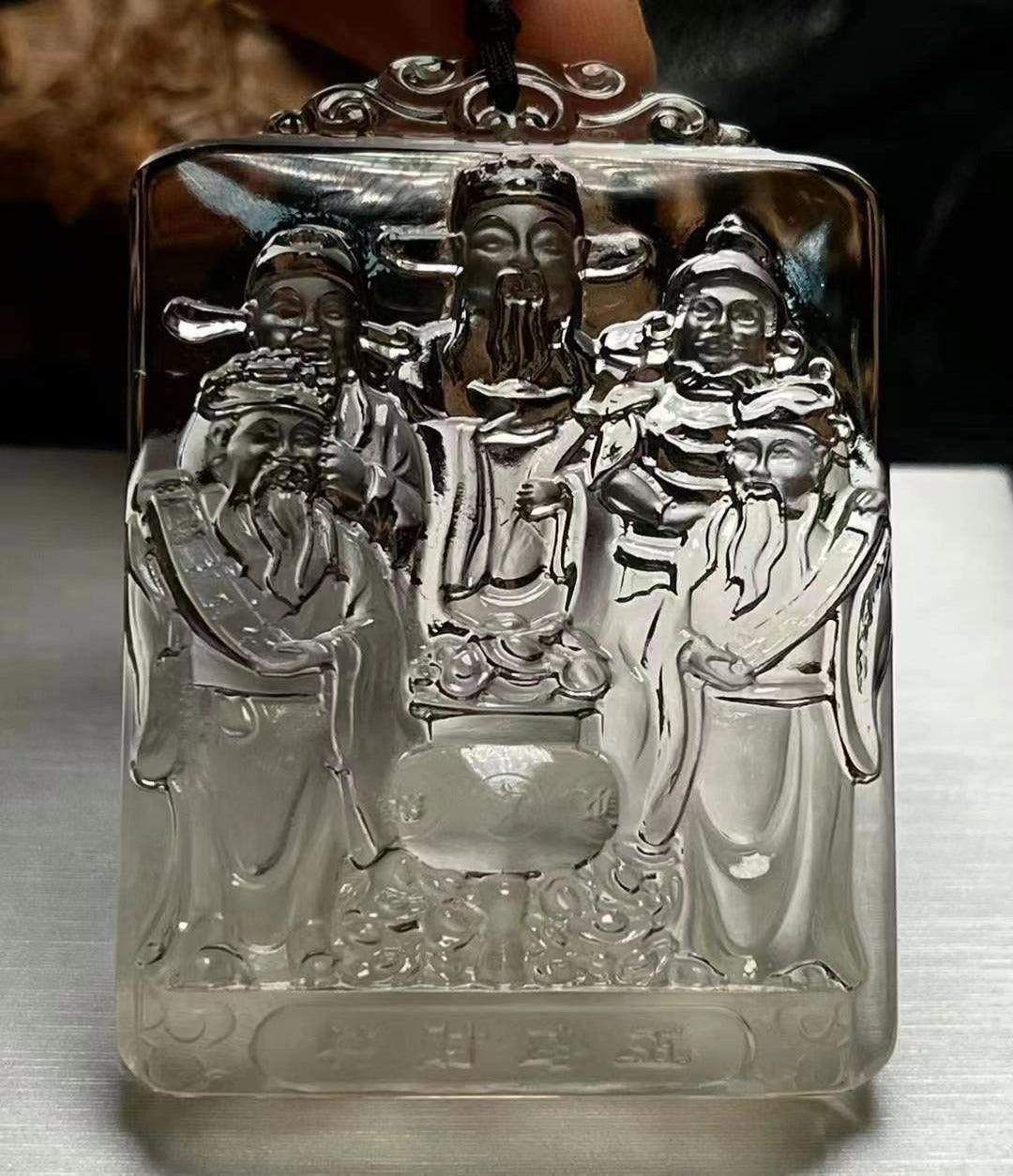 Collection of Superb large Natural Light Tea Crystal Carved Five-Way God of Wealth Pendant.