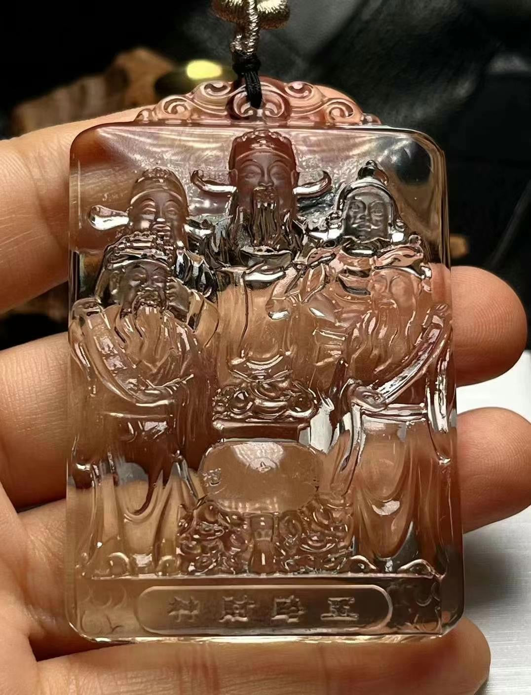 Collection of Superb large Natural Light Tea Crystal Carved Five-Way God of Wealth Pendant.